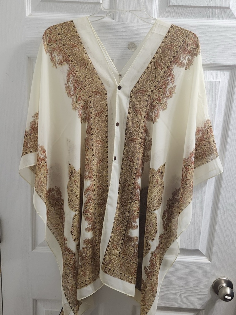 Convertible Button front/Back ponchos.